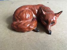 BESWICK CURLED FOX WITH WHITE TAIL 1017 BY ARTHUR GREDINGTON.