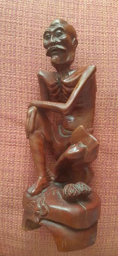 Wooden figurine depicting - figurine,