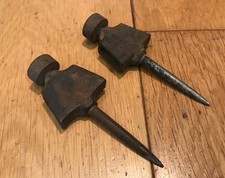 PAIR CAST IRON AND STEEL POINT