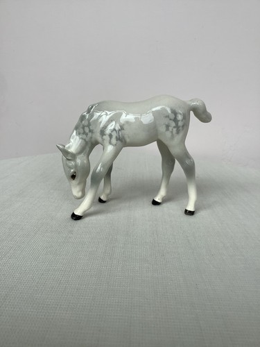 Beswick grazing foal - beswick, v