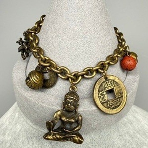 Vintage brass tone asian motif - brass,