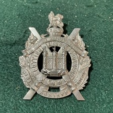 THE KINGS OWN SCOTTISH BORDERS CAP BADGE. White metal  odd6