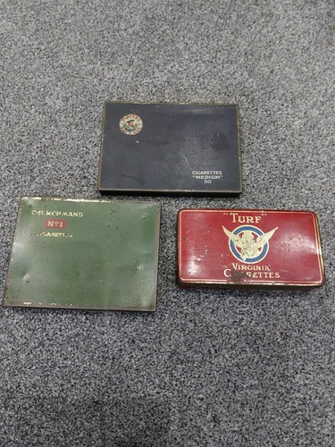 Old tobacco tins turf - -,