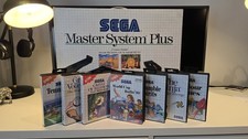 Sega Master System plus  – Boxed console, light gun + 7 games.