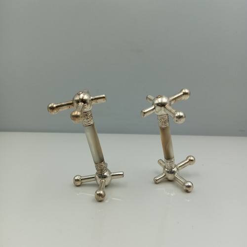 Pair silver plated and - of,