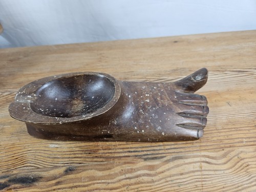 Hand carved likely west - hand,