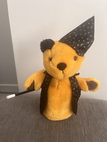 Sooty wizard hand - hand, with