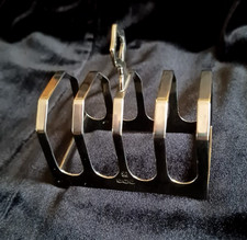 Delightful small solid silver toast (letter?) rack. Art Deco?