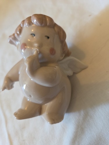 Nao shushing cheeky cherub - nao,