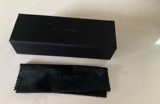 J K London black glasses /