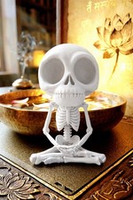 Meditating skeleton figurine - meditating,