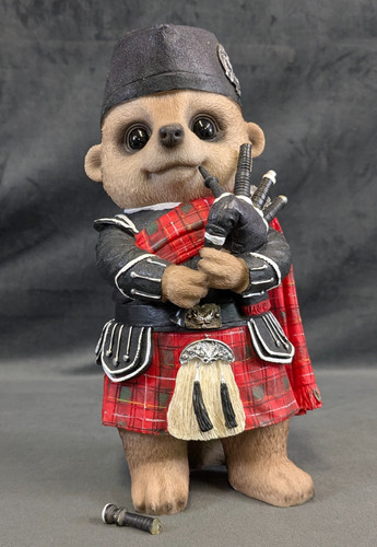 Scottish bagpiper meerkat - bagpiper,