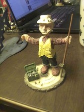 Adorable Fisherman Figurine