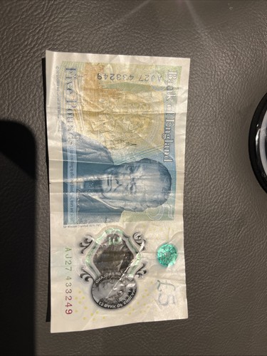 Five pound note - five,