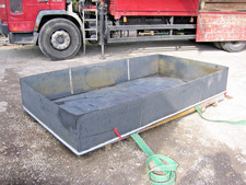 TANK   BUND  OPEN TOP  EX WATER AUTHORITY   APPROX 325  GAL CAP