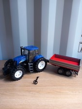 Bruder T8040 New Holland Tractor With Trailer & Steering Wheel Attachment 