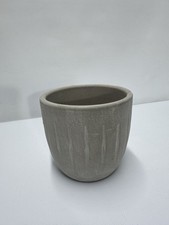 concrete or cement-look plant pot, suitable for both indoor and outdoor use