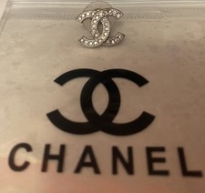 Chanel Silver Tone Logo Shaped