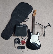 Fender Starcaster with SP10 amp and accessories