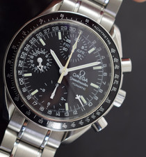 omega speedmaster triple date