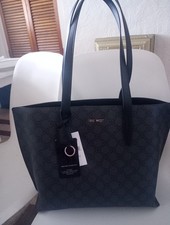 Nine West Jet Black Logo