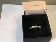 A pre owned DQCZ 3 pearl and 4 stone silver ring size Q-R 2.3gm