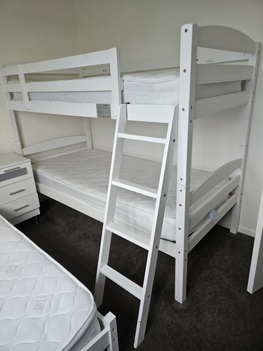 White bunk beds with - bunk,