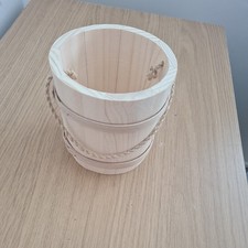 WOODEN BUCKET IN DIAMETER 11 CM WITH CORD AS A HANDLE