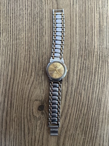 Pelex quartz 18k gold