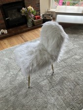 White faux fur accent chair
