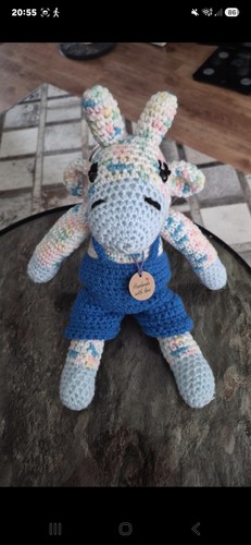 Handknitted giraffe toy with - handknitted,