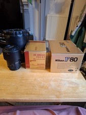 Nikon Camera And 2 Lenses