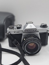 Asahi Pentax K1000 SLR with Pentax SMC 50mm f/1.7 Lens & Case – Good Condition