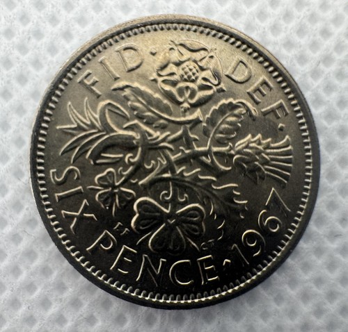 Uncirculated capsuled sixpence