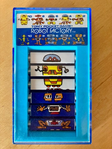 Vintage tomy pocketeer robot - tomy,