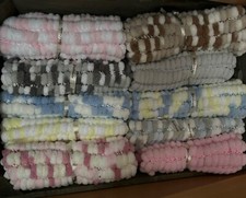 hand knitted pompom blanket-