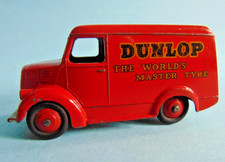 Vintage red Dinky Toys DUNLOP branded TROJAN van with red hubs. Made in England