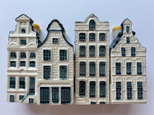 KLM delft blue miniature houses x4 by Bols Nos 25,30,67,69.  Seals intact. Empty