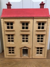 Vintage wooden dolls house.
