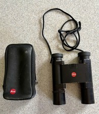 Leica Trinovid 10x25 BC includes leather carry case and strap