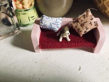 doll house wooden sofa with tiny dog