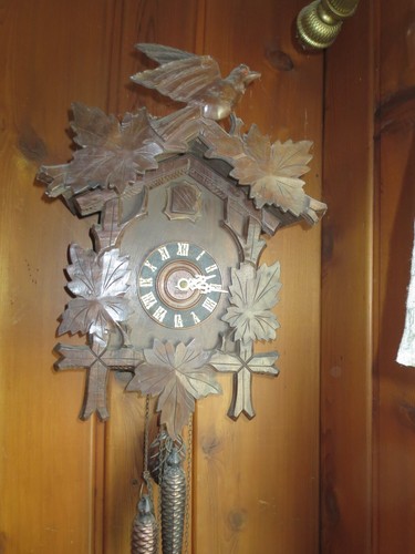 Old cuckoo clock with - cuckoo,