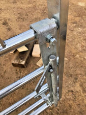 Drop bolt for metal farm gates