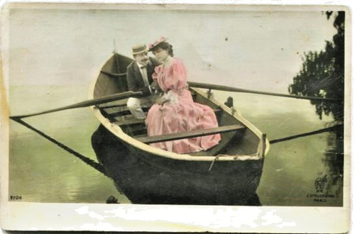 Young couple rowing boat - rowing,