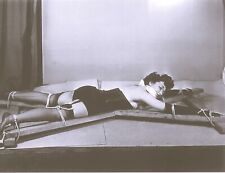 Mature Model In Seamed Black Nylons And Black Lingerie Outstretched 52