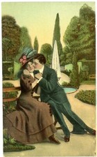 French Man Kissing His Woman's