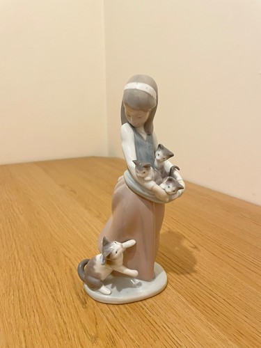 Lladro following her cats - lladro,