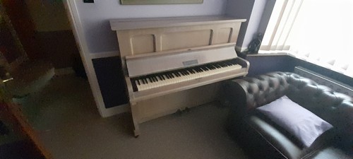 Upright piano price reduced - an,