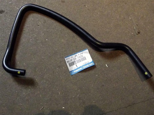 Hose breather from cam cover
