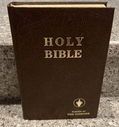 Holy bible placed the - holy, by